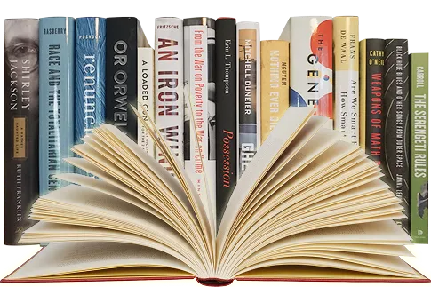 An open book with several stacked books resting on top, showcasing a variety of titles and colors.